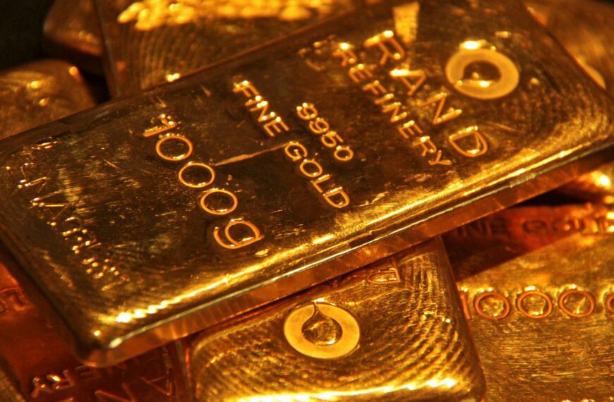 Gold rushes past record $5k in hedge against Trump