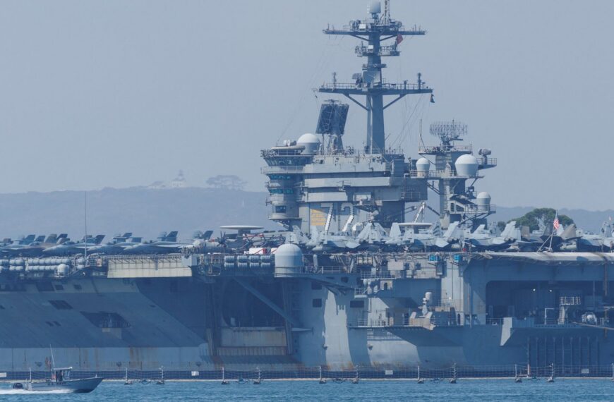 Iran warns any attack will mean ‘all-out war’ after Trump says US ‘armada’ on its way