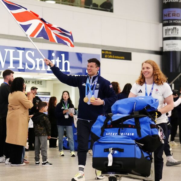 Jubilant Team GB return home after record-breaking Winter Olympics