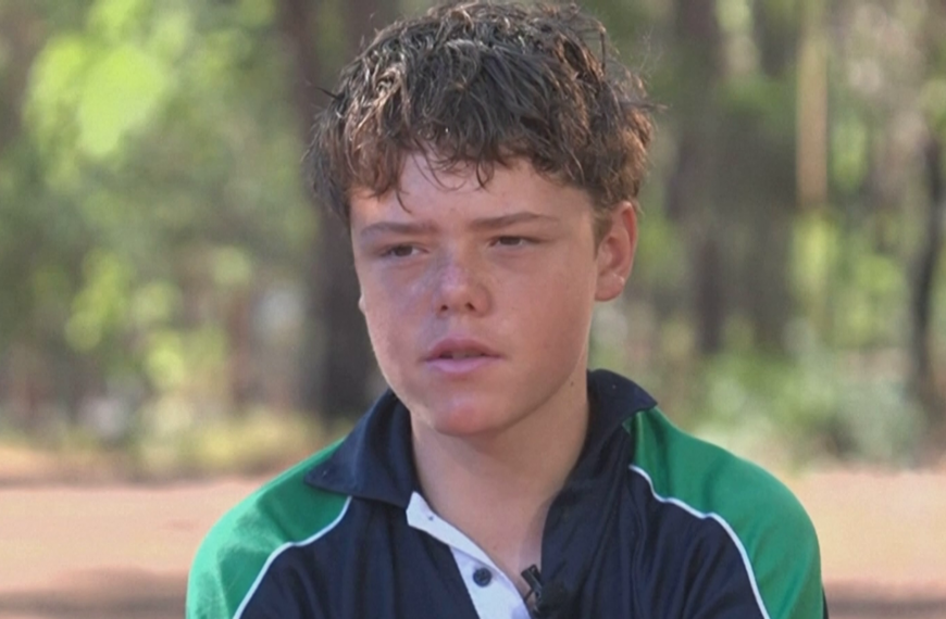 Police release call from boy, 13, who swam for hours to save his family stranded at sea