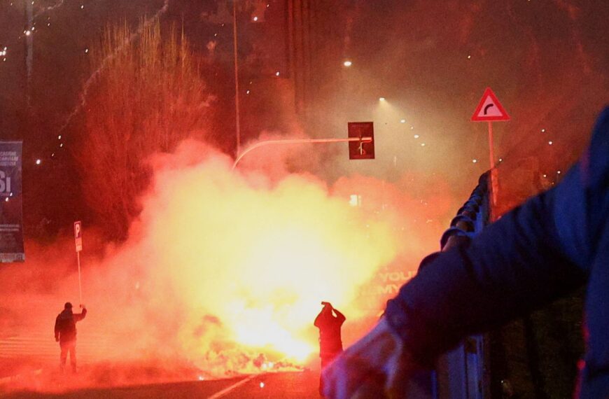 Italian police fire tear gas at protesters near Olympics venue