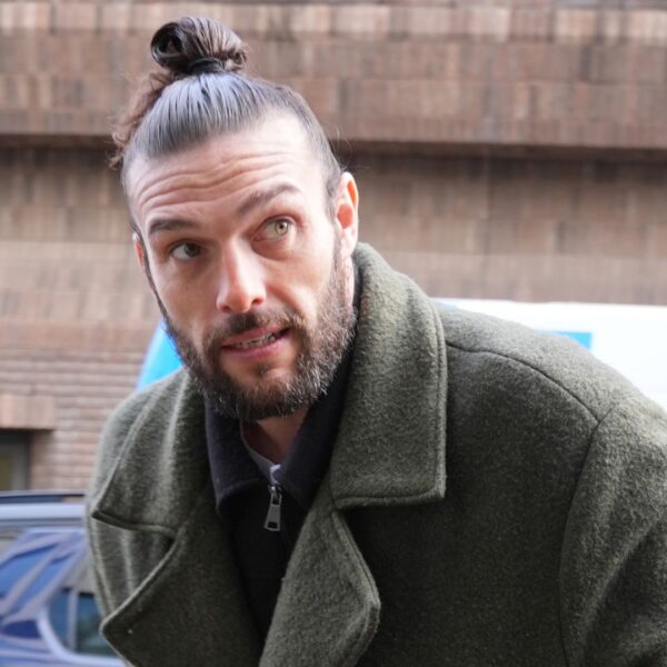 Ex-England footballer Andy Carroll pleads not guilty to breaching court order against ex-wife
