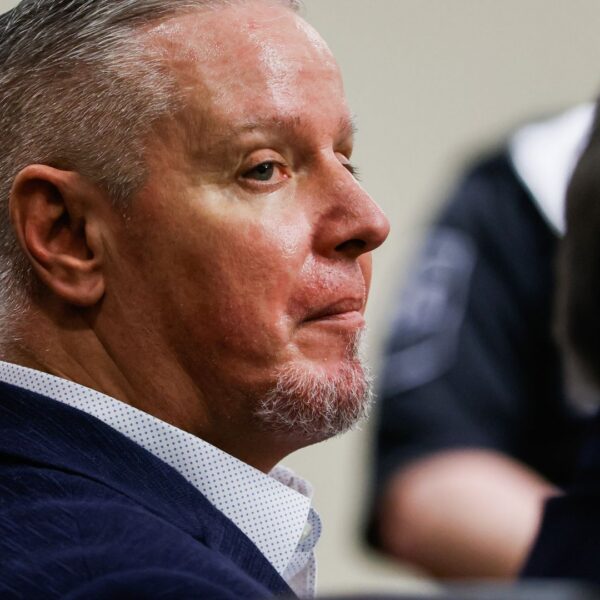 Father who gave son rifle used in high school shooting found guilty of murder