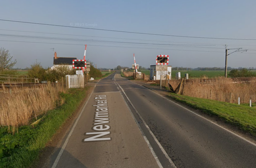 One person dies in collision involving car and train at level crossing