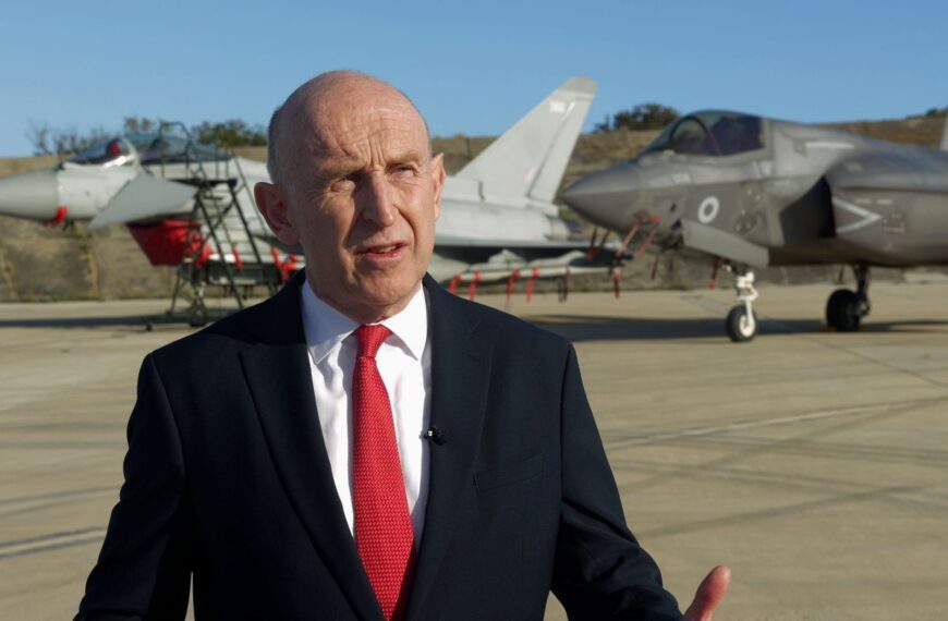 Defence secretary twice declines to rule out Britain joining strikes on Iran