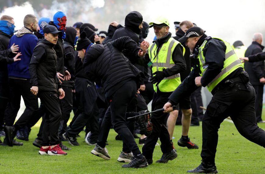Rangers and Celtic fans in ‘shameful’ clashes on pitch after Scottish Cup tie